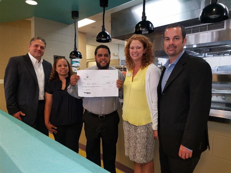 Pictured right to left: AVP Sean McCullough, Trinity Cafe Manager Mandy, Tampa West BM Jhonny Vidal, Tampa East BM Maria Peralta Heredia, VP Sal Scaffidi.
