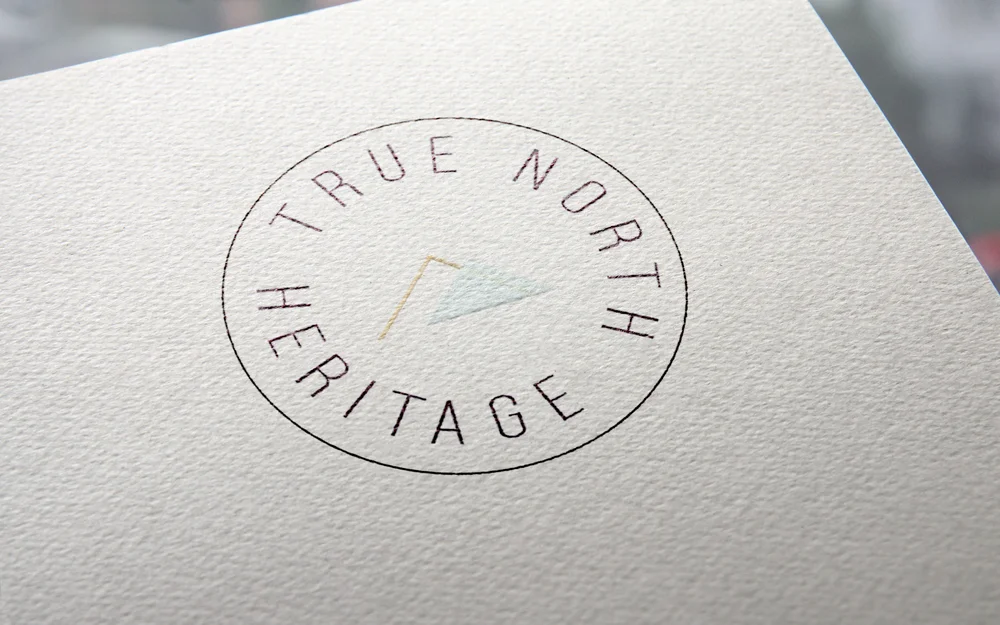 TNH+Round+on+paper.jpg