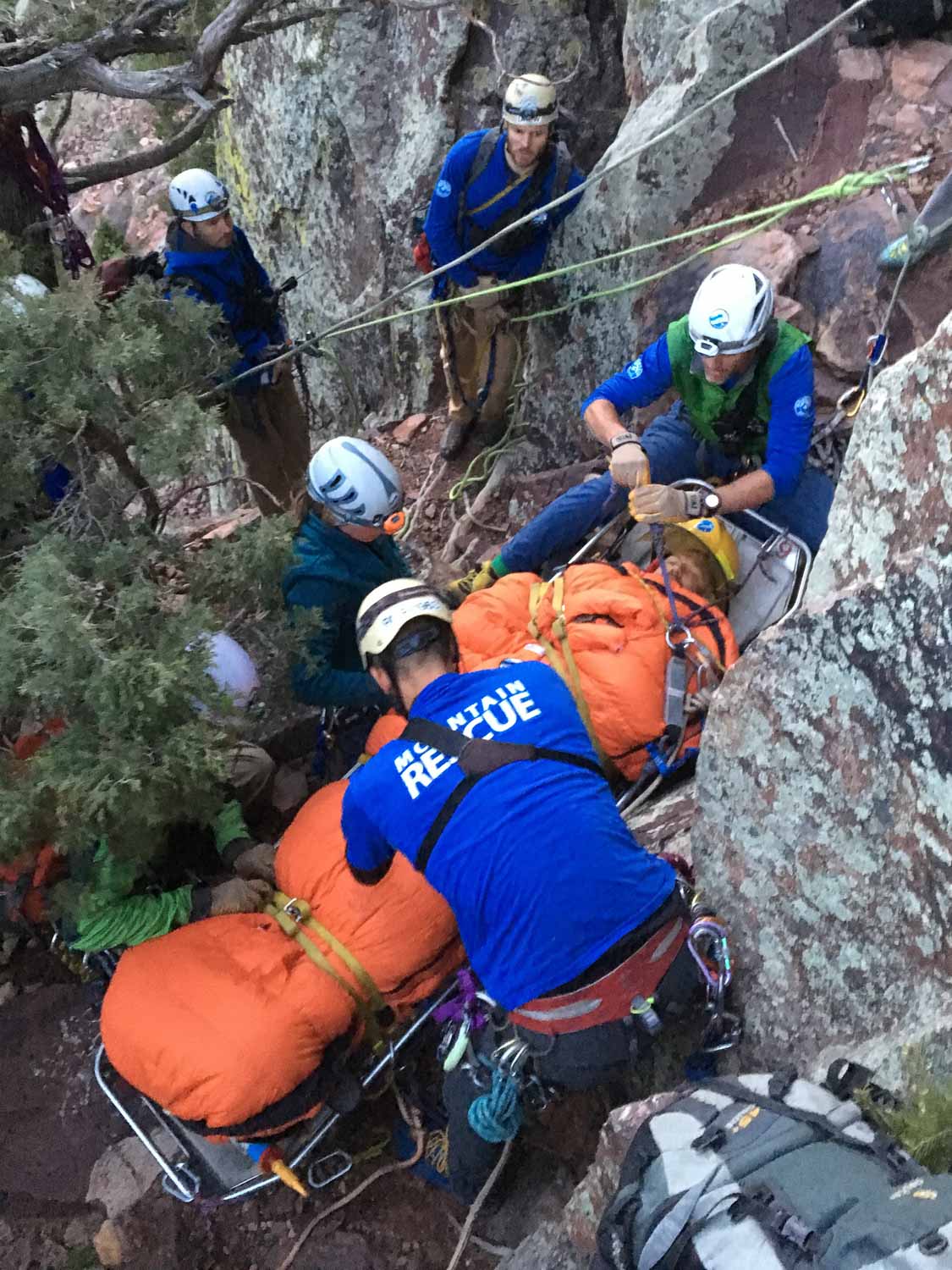 "Packaging" a simulated patient into the RMRG litter prior to vertical evacuation