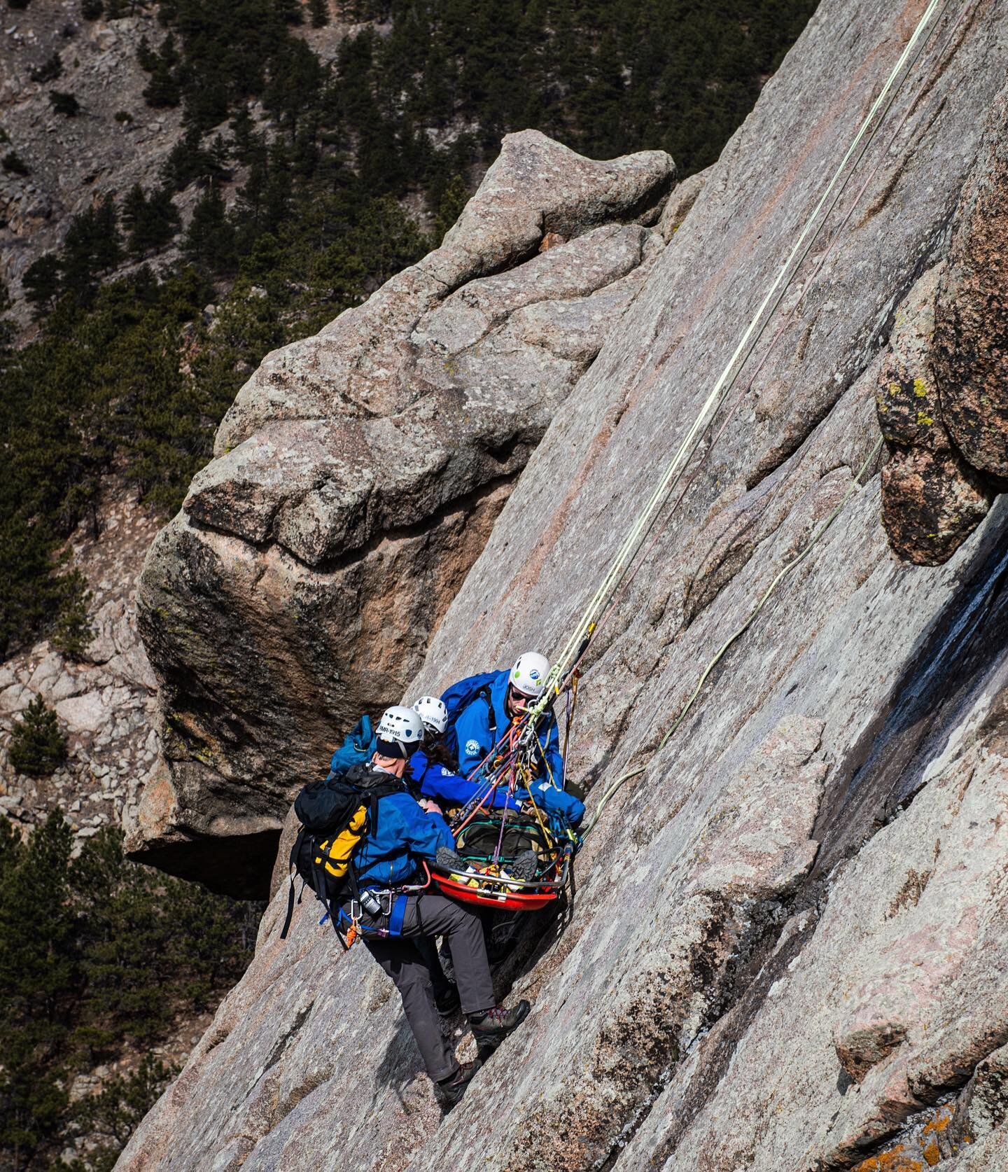 High-angle vertical evacuation training in Boulder Canyon. Rocky Mountain Rescue practices speed and mastery of complex rope systems by doing laps up and over Elephant Buttress in Boulder Canyon, simulating rescue scenarios in vertical terrain. Our m