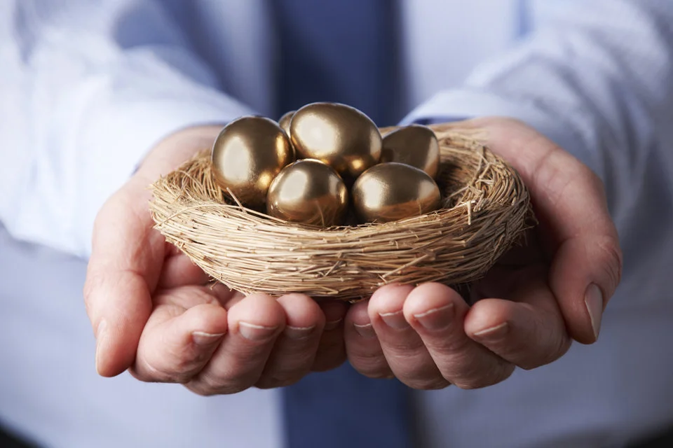 Gold-nest-with-hands.jpg