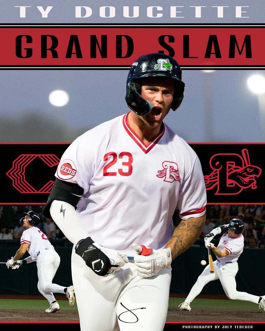 A baseball player wearing a white uniform with red accents and the number 23 on it, celebrating during a game. He is wearing a black helmet and batting gloves. There are two other players in the background, one running and the other swinging a bat. T