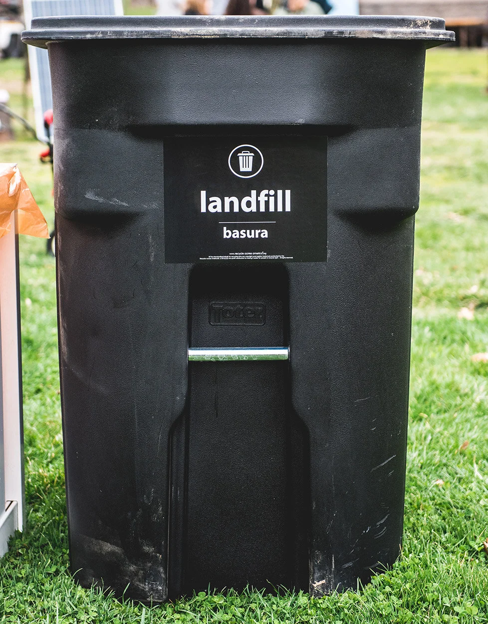 Black landfill trash cart used for weekly residential trash pickup by Gretna Sanitation, serving Gretna, Papillion, and La Vista in Sarpy County NE.