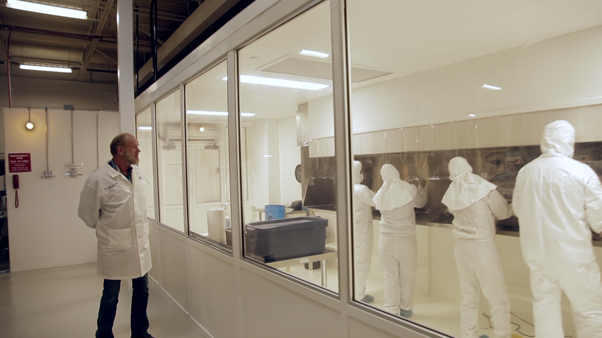 Dr. John Holiday, Aloha Medicinals inspecting clean room