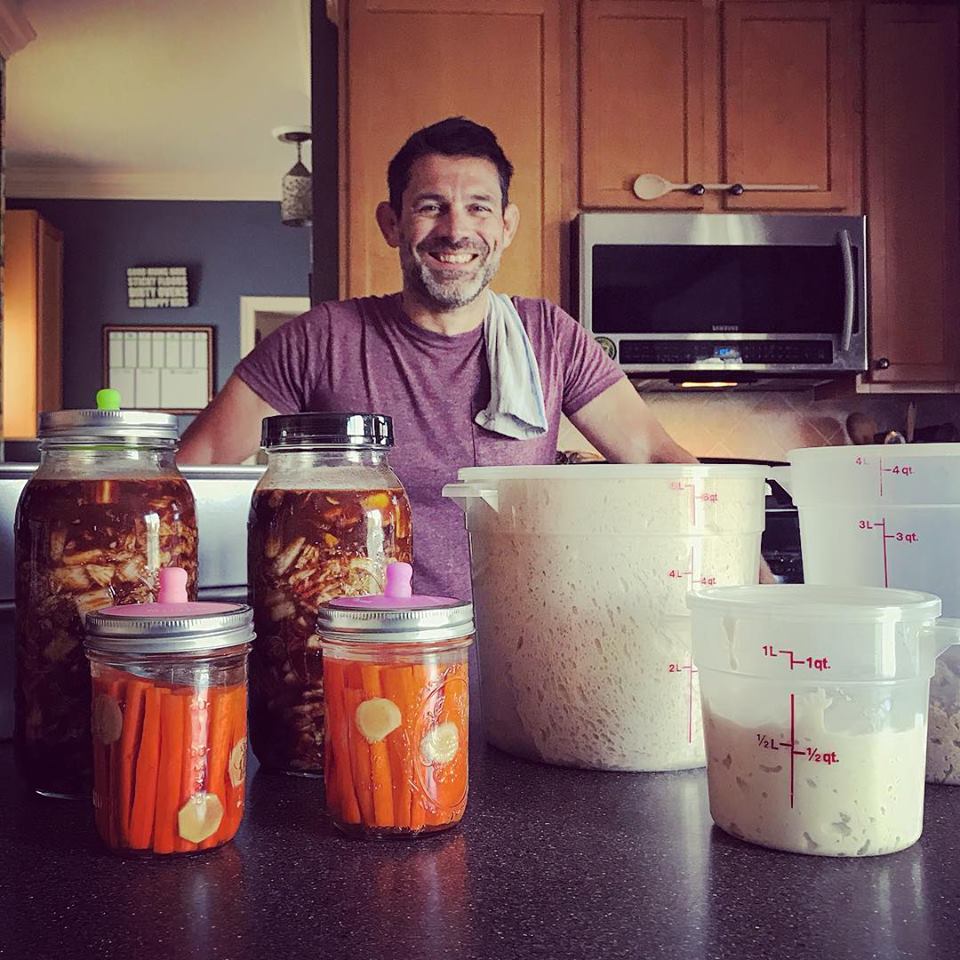 Getting ready for school lunches is nothing ordinary in our house! Kimchi and carrot sticks are fermenting. The sourdough bread, sandwich bread and Volkornbrot whole grain bread is rising. Yogurt is culturing. And this Dad is smiling because he’s surrounded with all his bubbling jars!