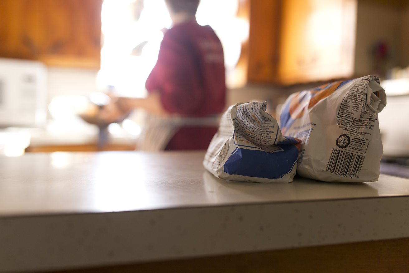I roll my flour bags the same way, and store them in the freezer, just like my mama.