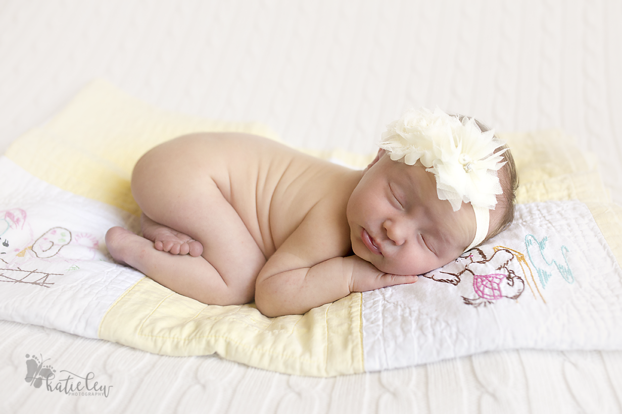 newborn baby girl bum up pose