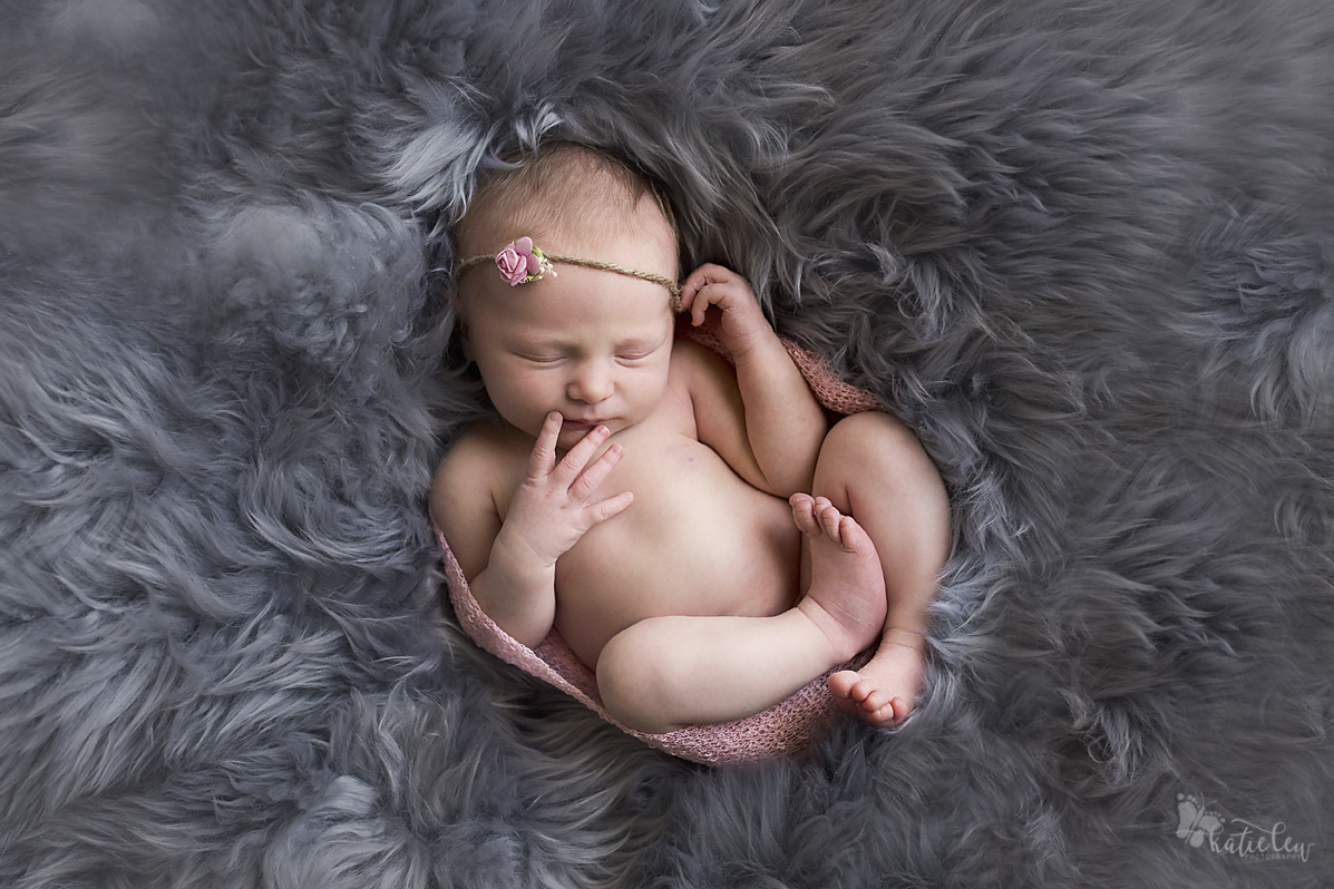 newborn baby wrapped up tight