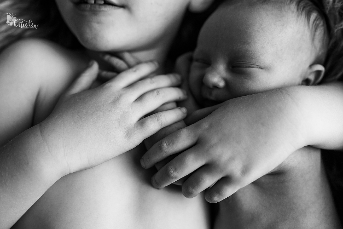 detail picture of sibling hands