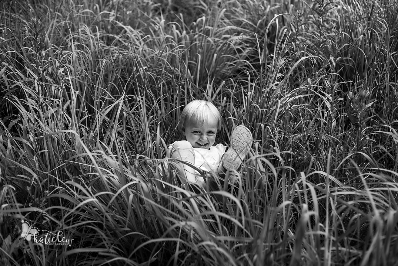 black and white in the grass