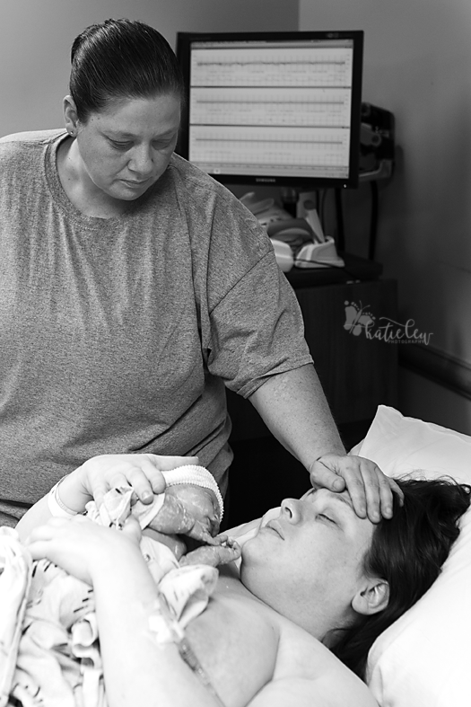 mom comforts daughter after birth