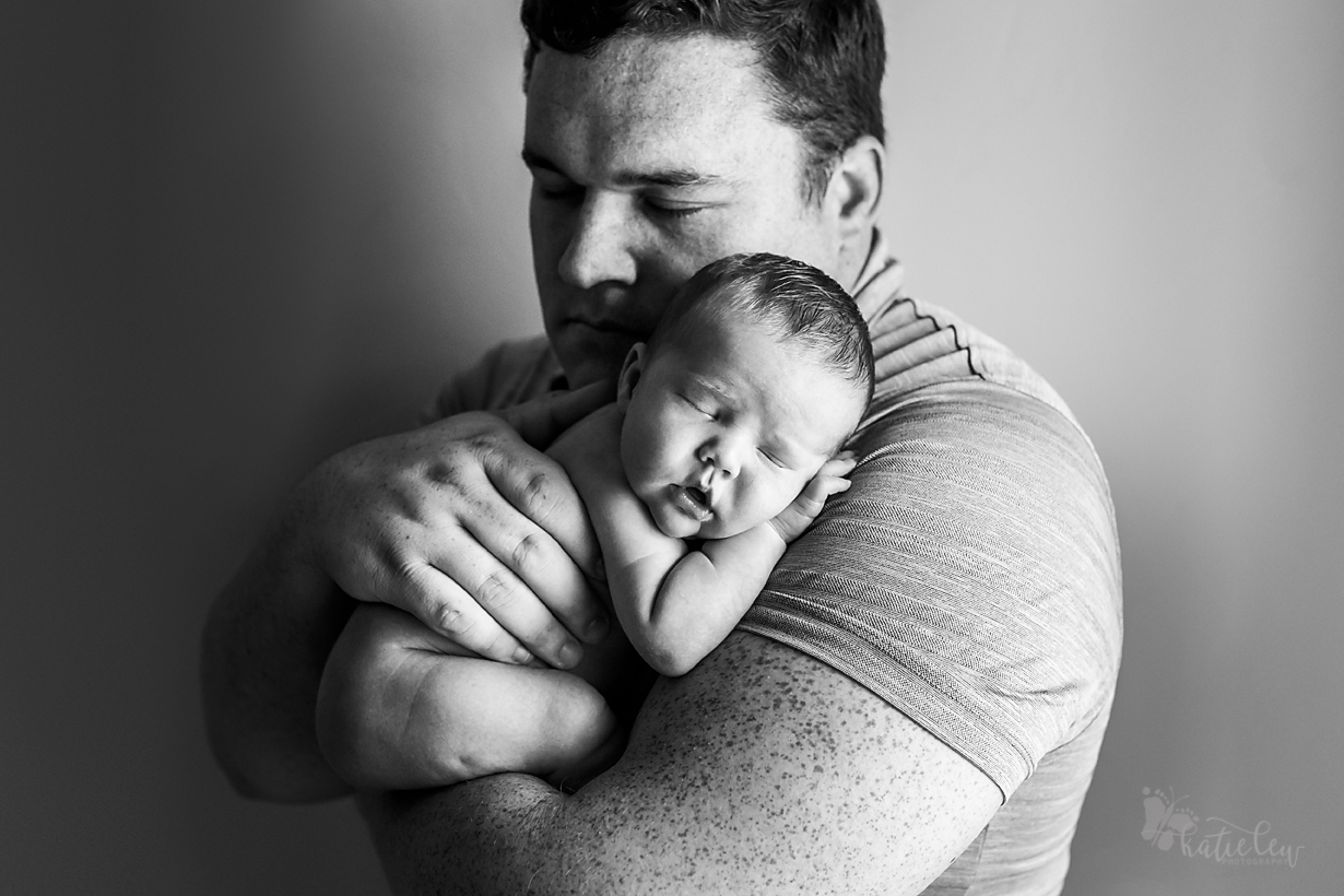 newborn boy with dad picture