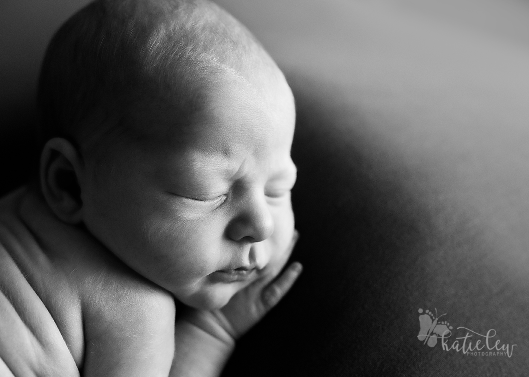 A black and white conversion of a baby girl sleeping.