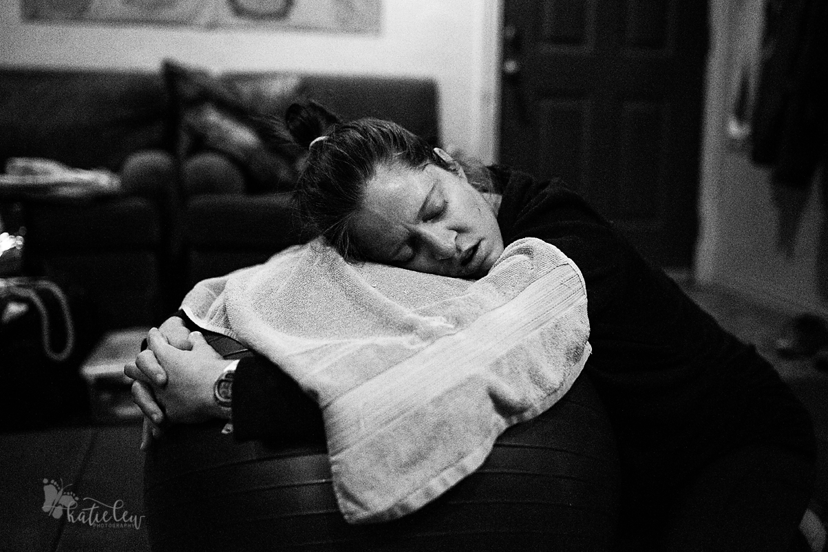 The mom resting in between contractions during her birth in northern oklahoma