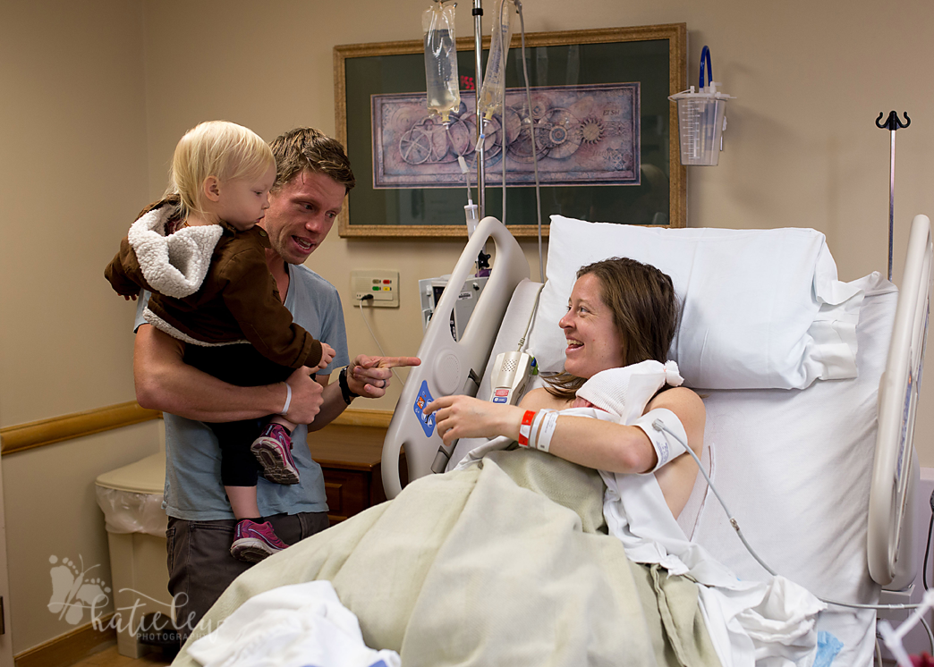 big sister meets her new baby sister for the first time