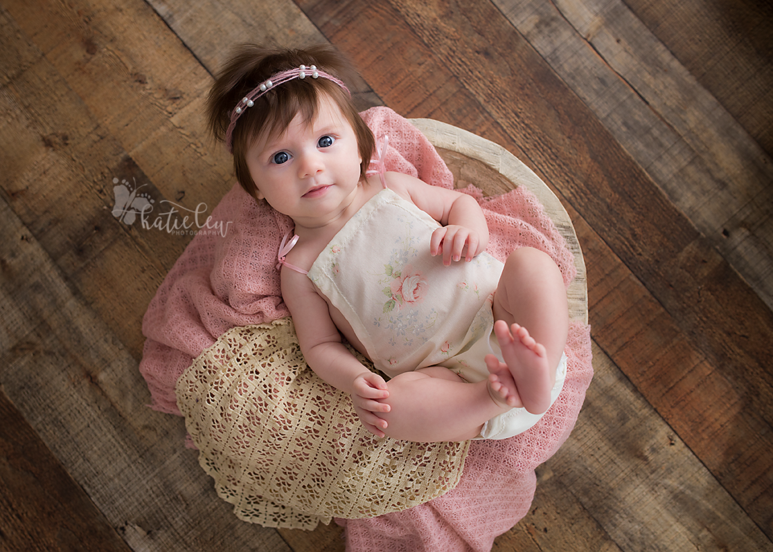 Stillwater Oklahoma baby photographer captures beautiful baby girl with a head full of hair