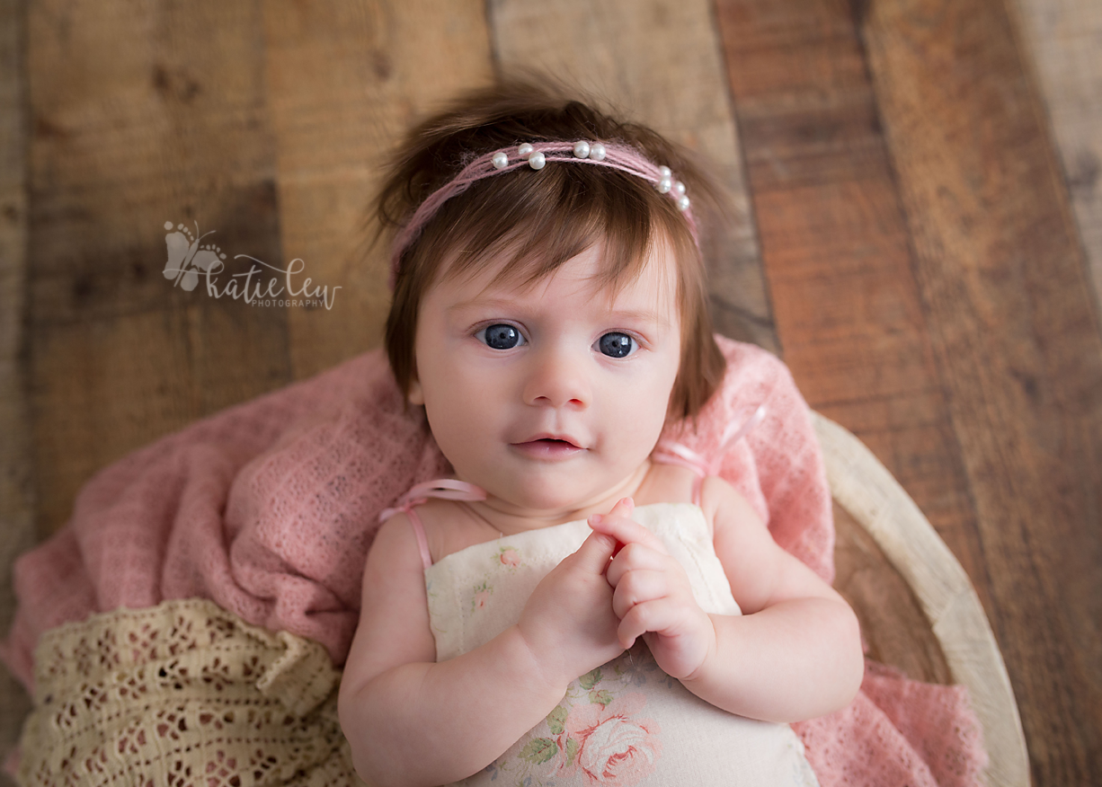 Stillwater baby photographer captures a curious face from this baby girl