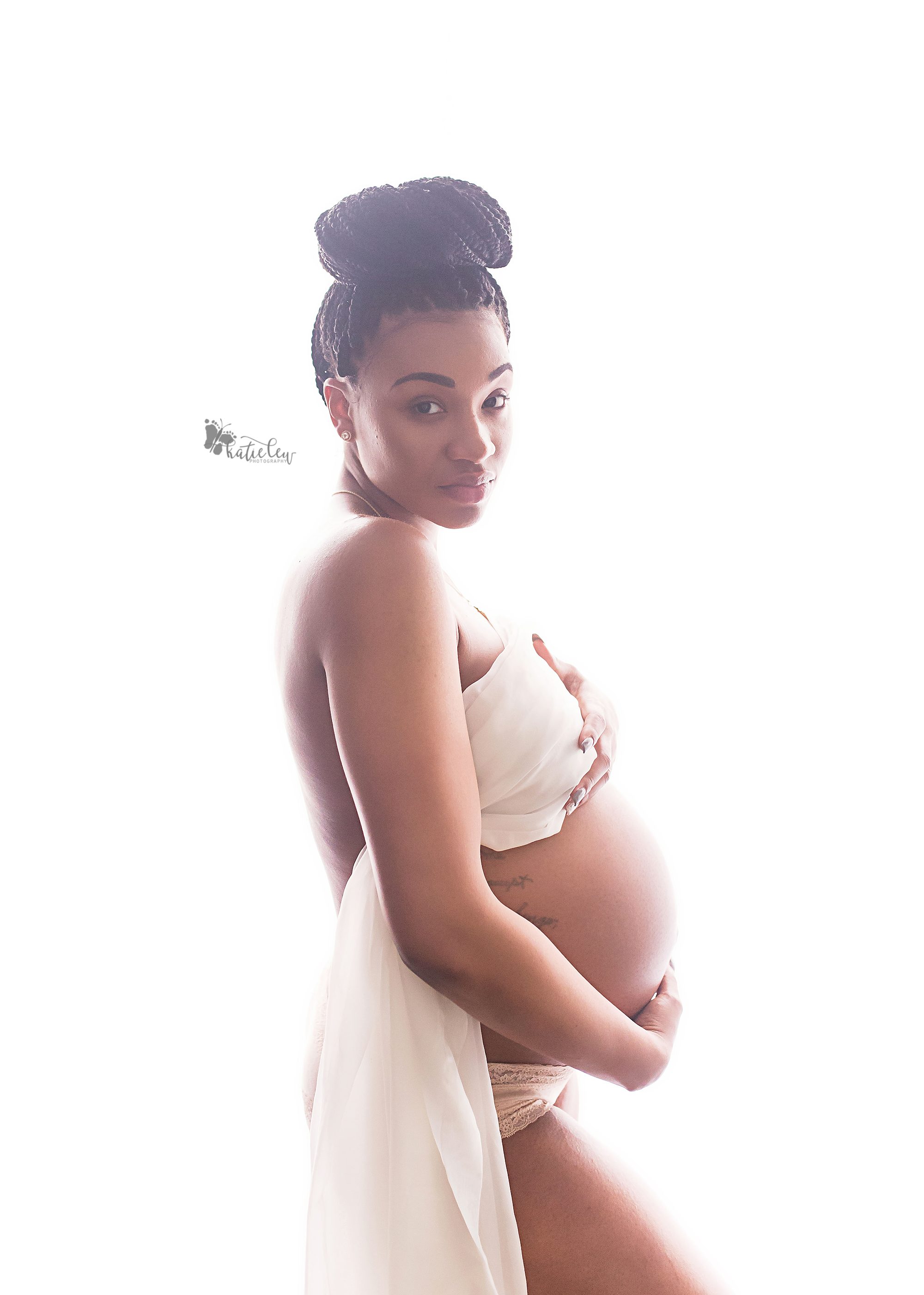 beautiful pregnant woman on a white background