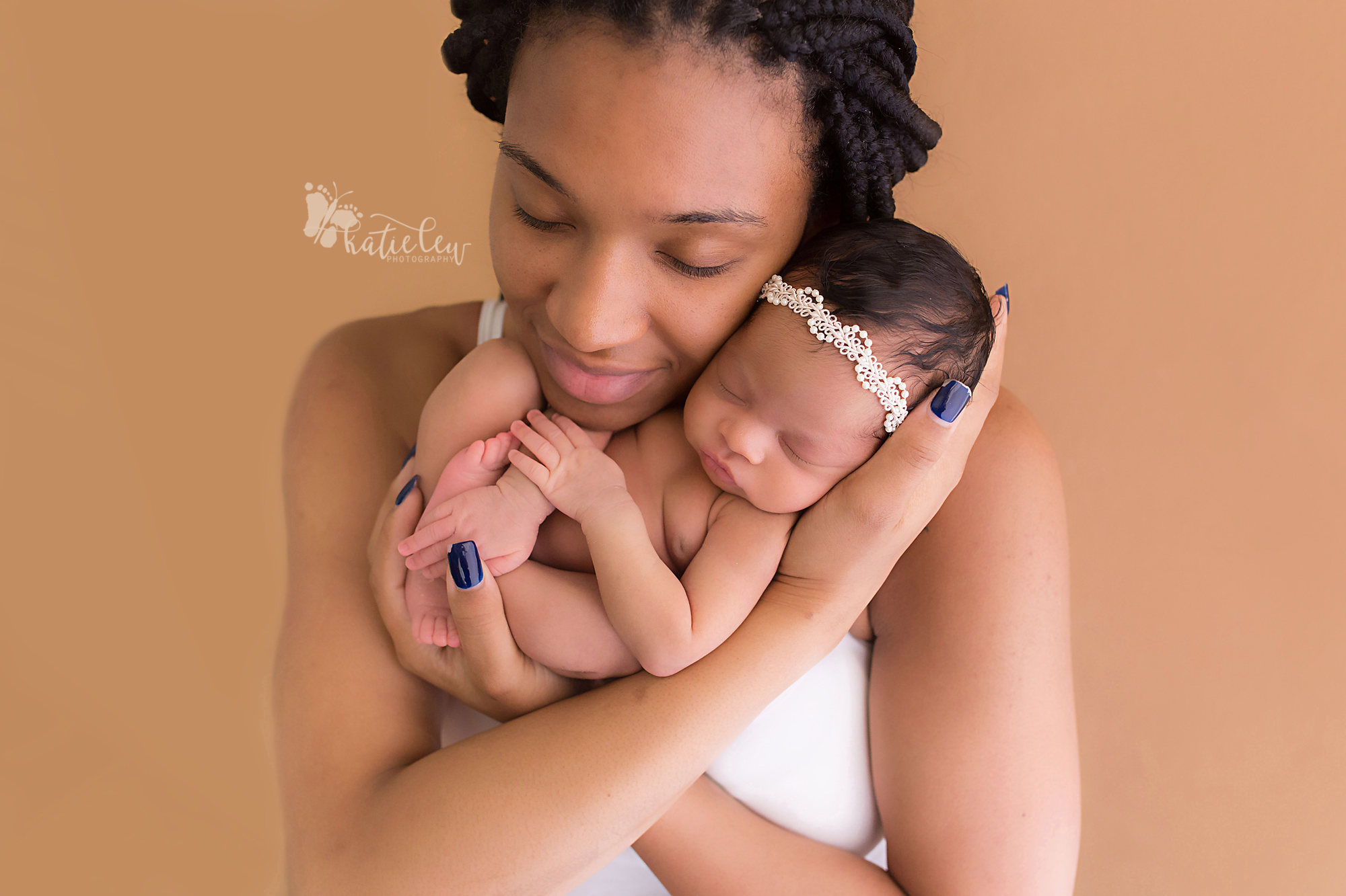 mom holding newborn baby