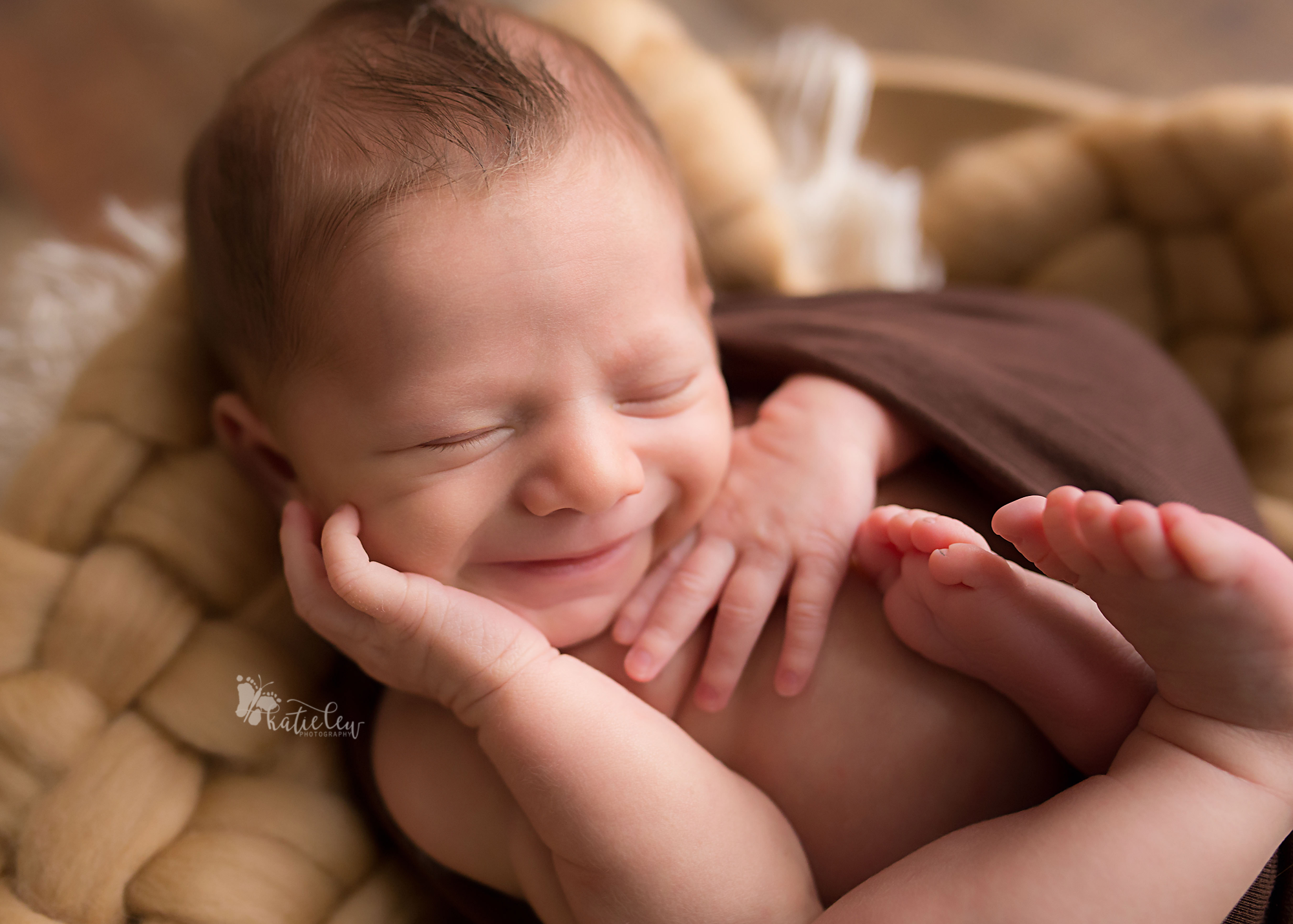 Newborn smiling so big while sleeping