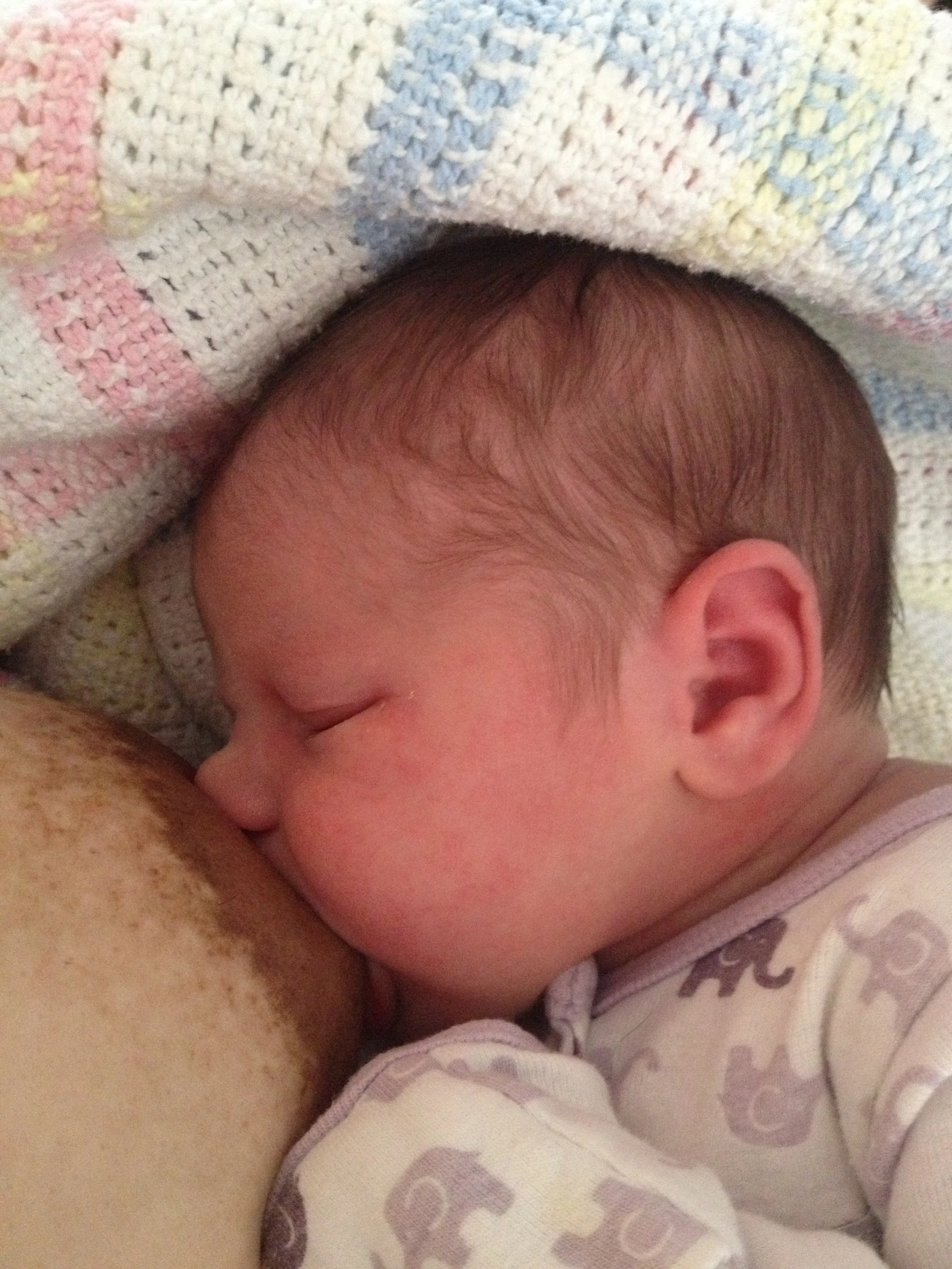 Nora, 1 day old. Latched on and breastfeeding well...or so I thought