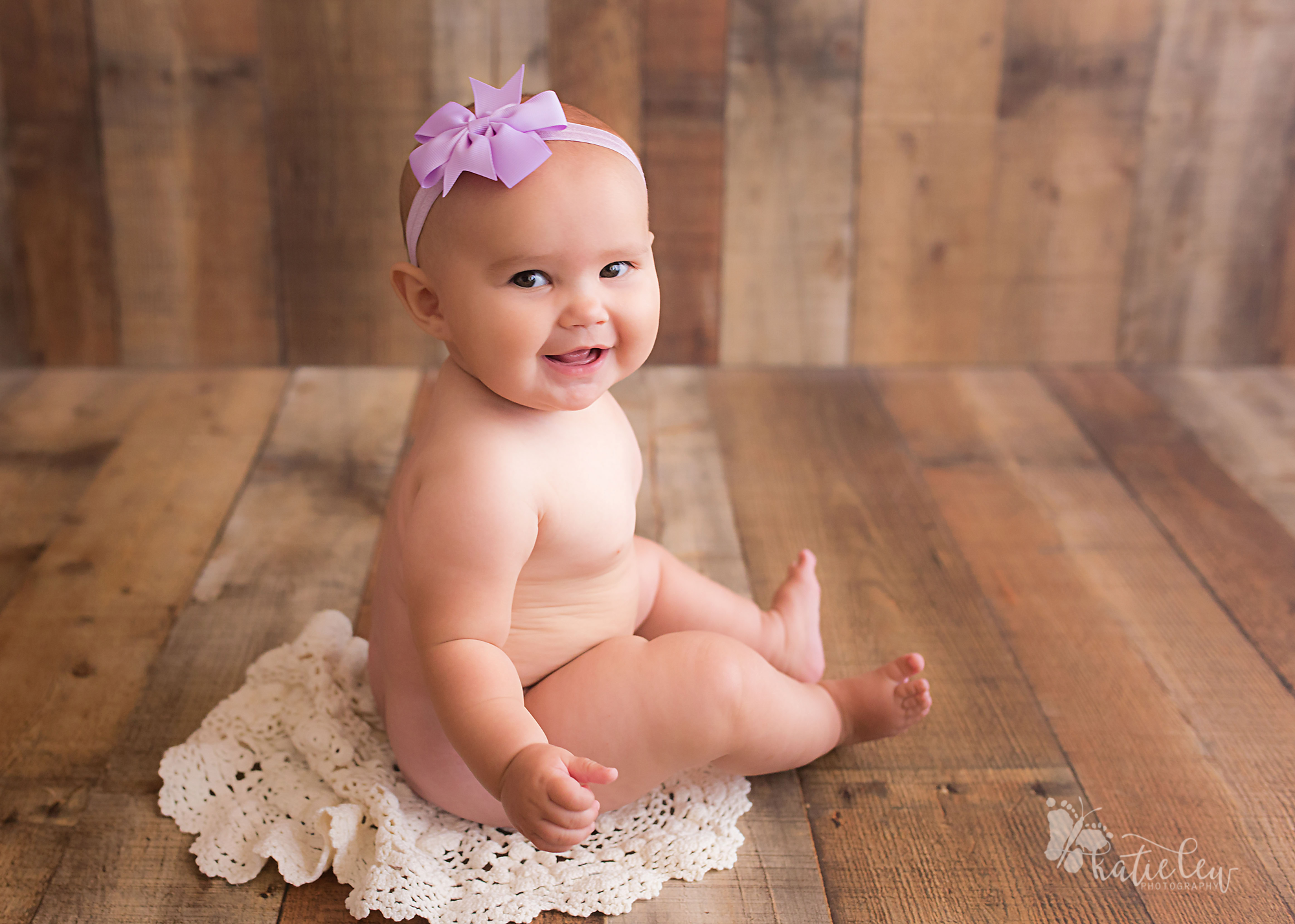 happy little 6 month old baby photographer