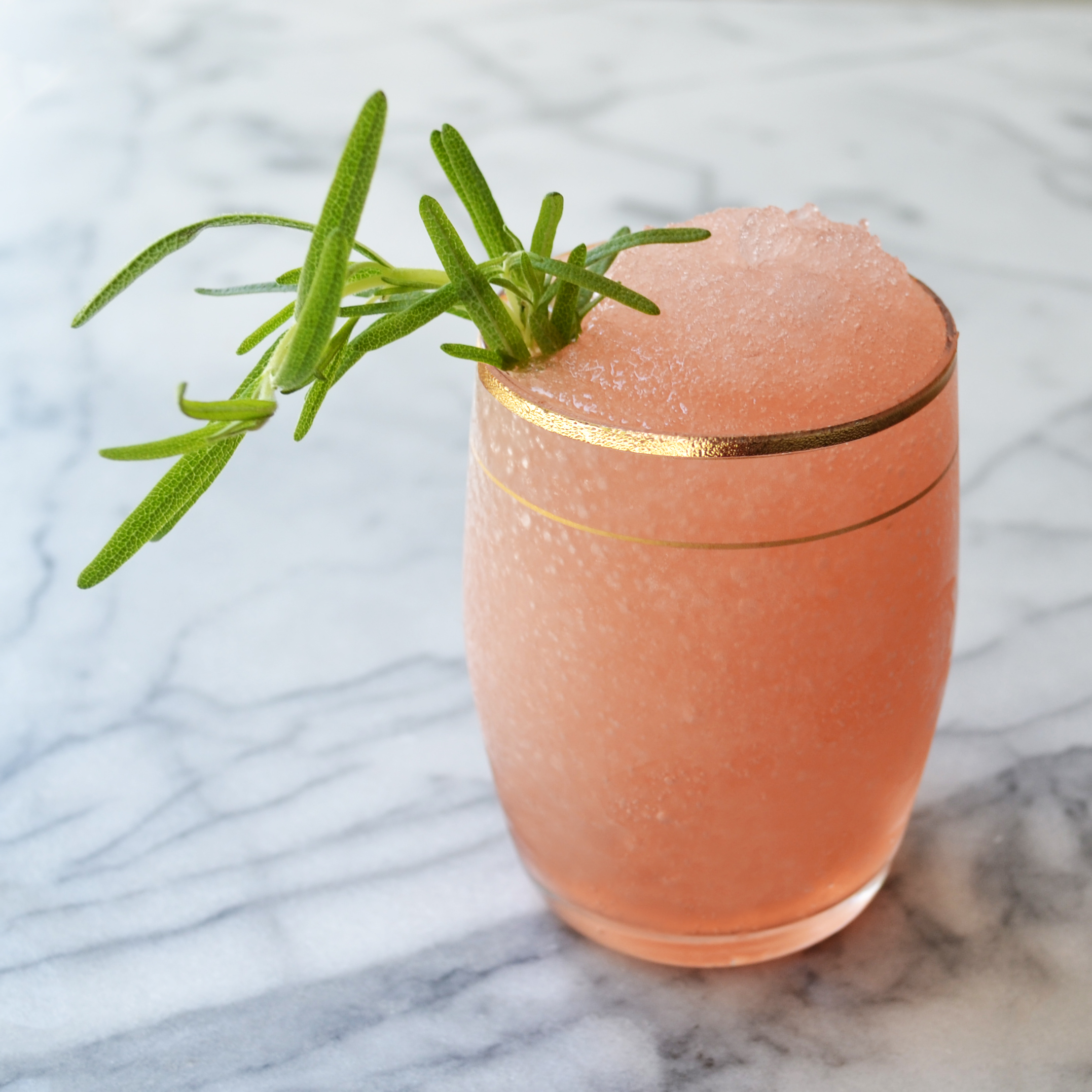 Frosé mary 1 bottle of rosé Ice 3 oz strawberry simple syrup 3 oz freshly-squeezed lemon juice Fresh rosemary garnish