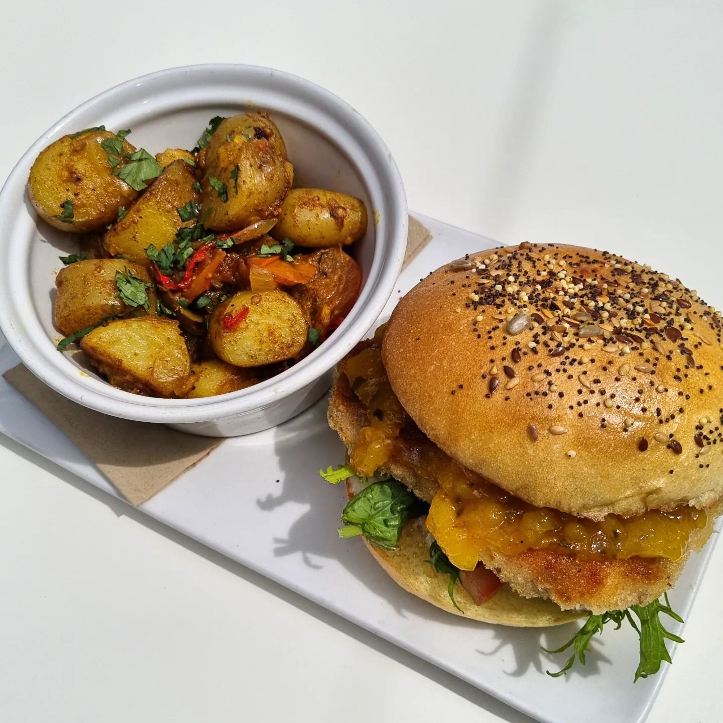 ○ Lunch Special ○
Panko Crumb Chicken Burger 
spiced carrot kraft
cumin mayo
house mango chutney 
Steve's leaves, vine tomato
Bombay potatoes