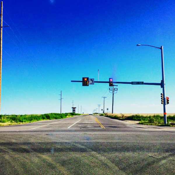 Ever since I saw "Castaway," I have sought a stoplight where the land stretches endlessly around it. This is halfway there (there's a community of houses behind the camera.)