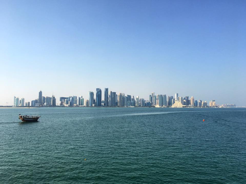 The city skyline over the Persian Gulf.