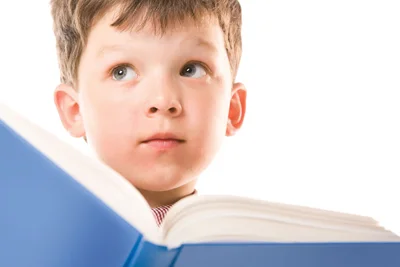 Preschool boy with book.jpg