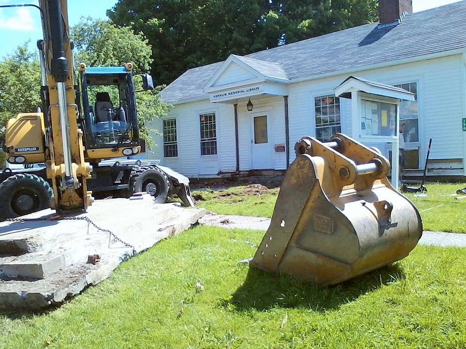 The old porch being taken away, making room for the new one! Photo by Paschal'Simon MacMurray
