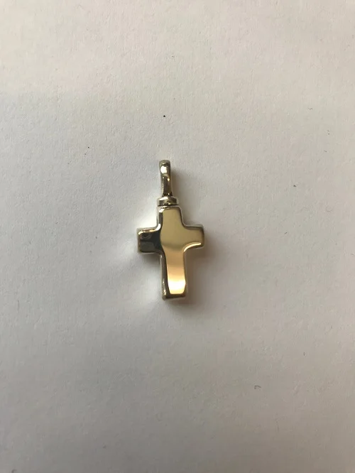Style #102SS Sterling silver small cross $130.00