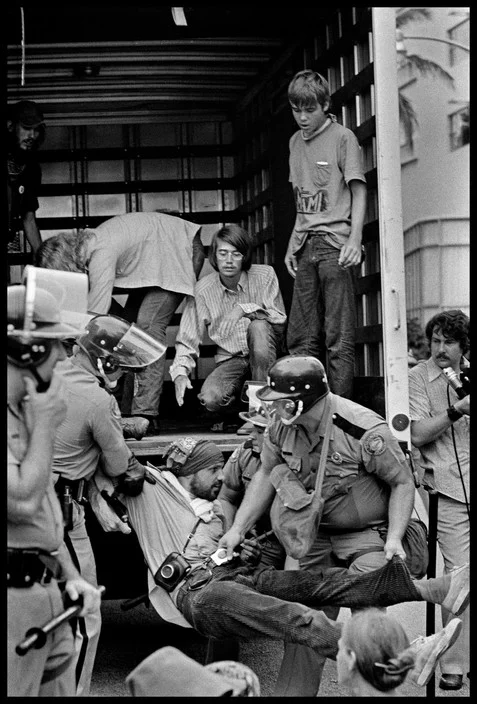 A van full of arrested anti-war protestors. Photographed by Abbas/Magnum.
