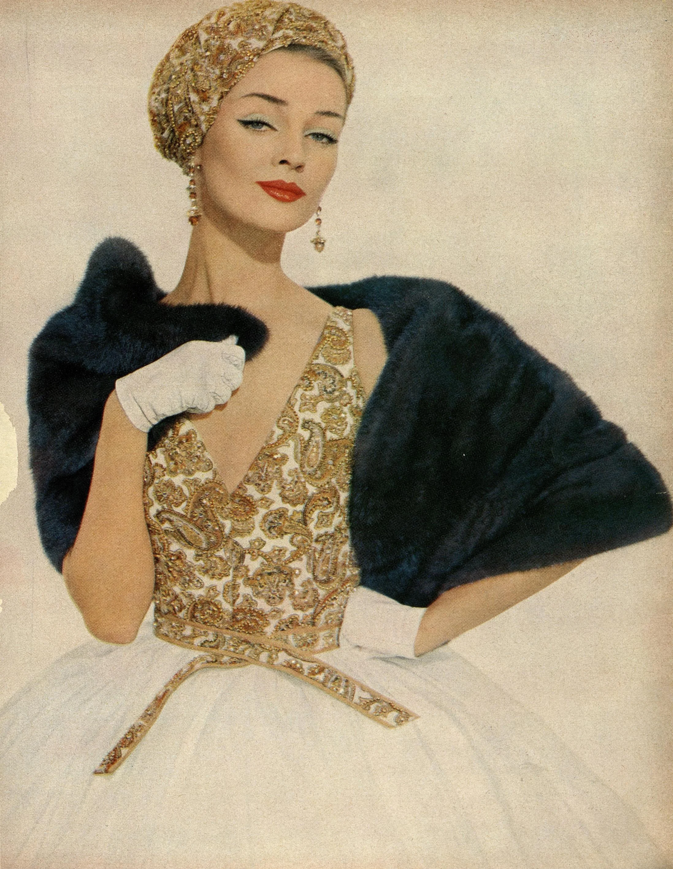 A hand-embroidered paisley challis top paired with an exuberant white organdie skirt; photographed by Richard Avedon for Harper’s Bazaar, March 1958.