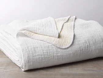 pdp_cozycottonblanket_stack_white_4.jpg