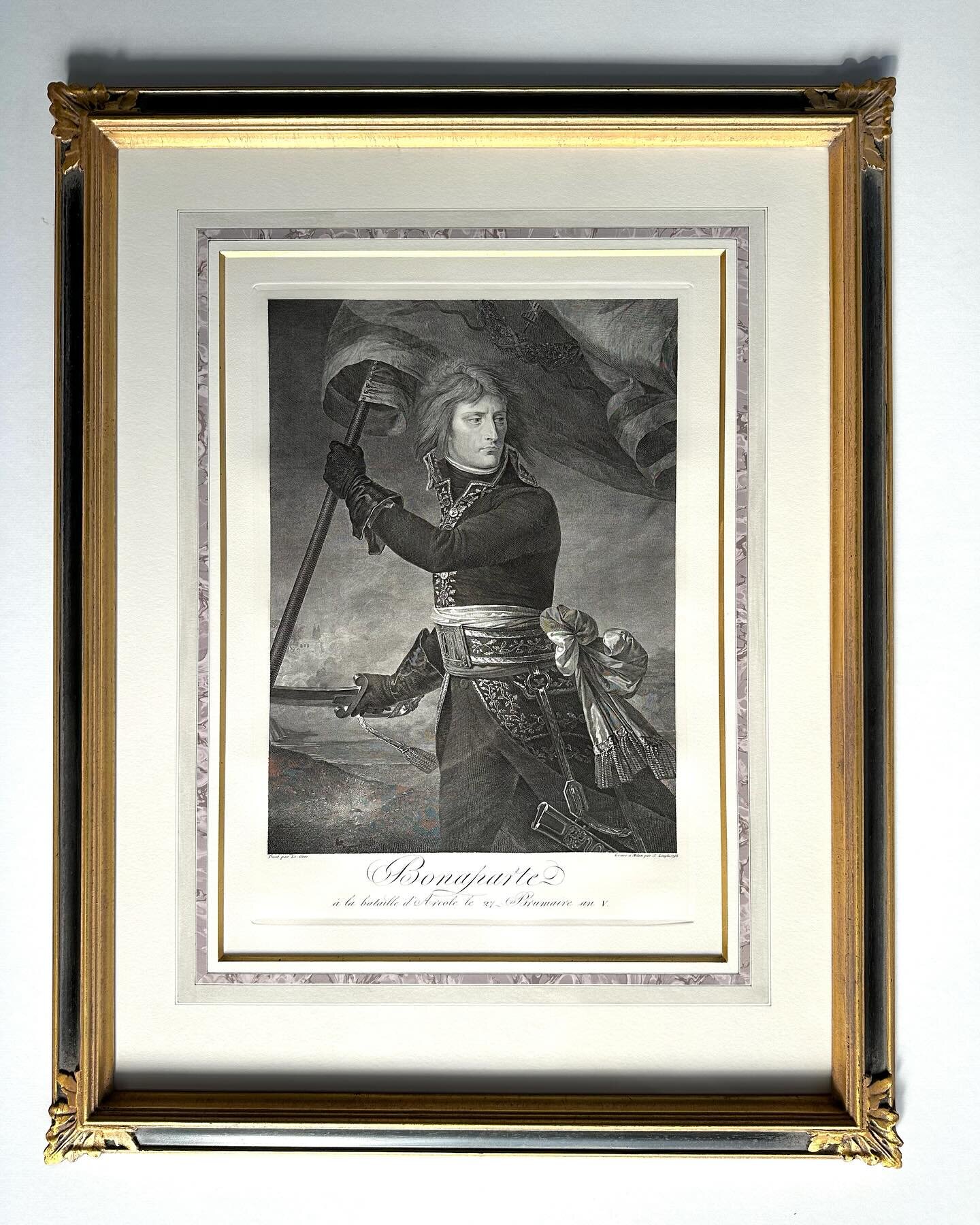 A beautiful final strike of this etching of Napoleon, looking most resplendent in one of our handcrafted frames. Acanthus leaf closed corner frame, gilded edges, and ornament, with a black panel. 8ply rag mat, with a gilded bevel and decorative Frenc