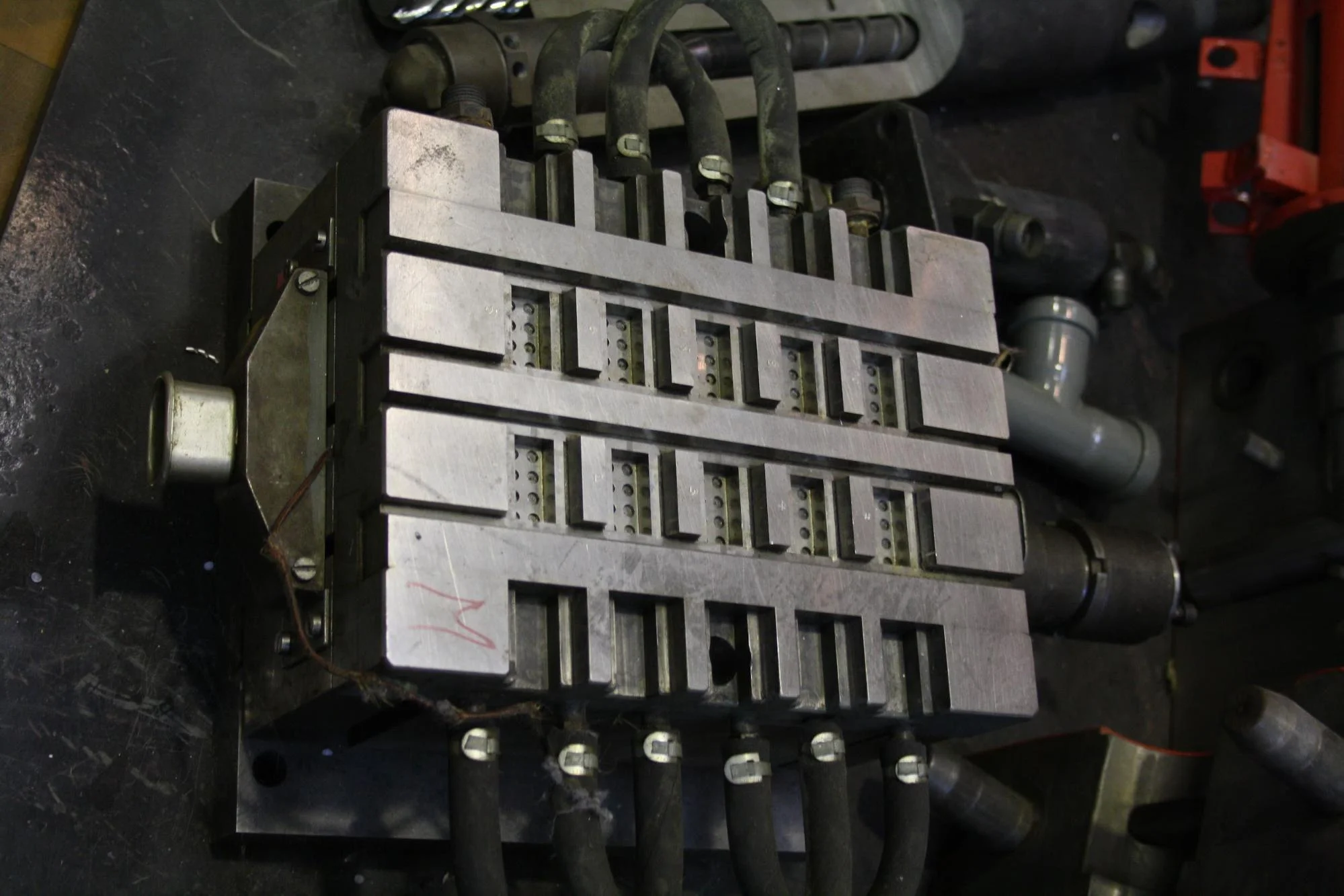 The upper-side tool for a Lego injection mold ( source ). You can see how it takes time to make something like this.