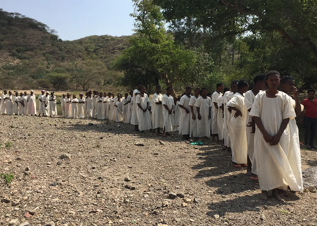 IMAGE - STORY - 10YRS ETHIOPIA - Babtism Line (Chuck W).jpg