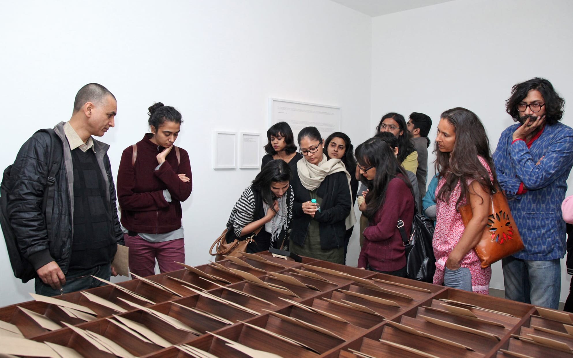  Visitors at Shilpa Gupta’s exhibition opening with the artists at Vadehra Art Gallery, 2016. Courtesy of Vadehra Art Gallery, New Delhi&nbsp; 