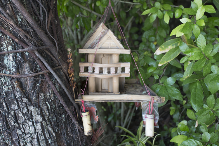 An old wooden 'spirit house' in the woodland