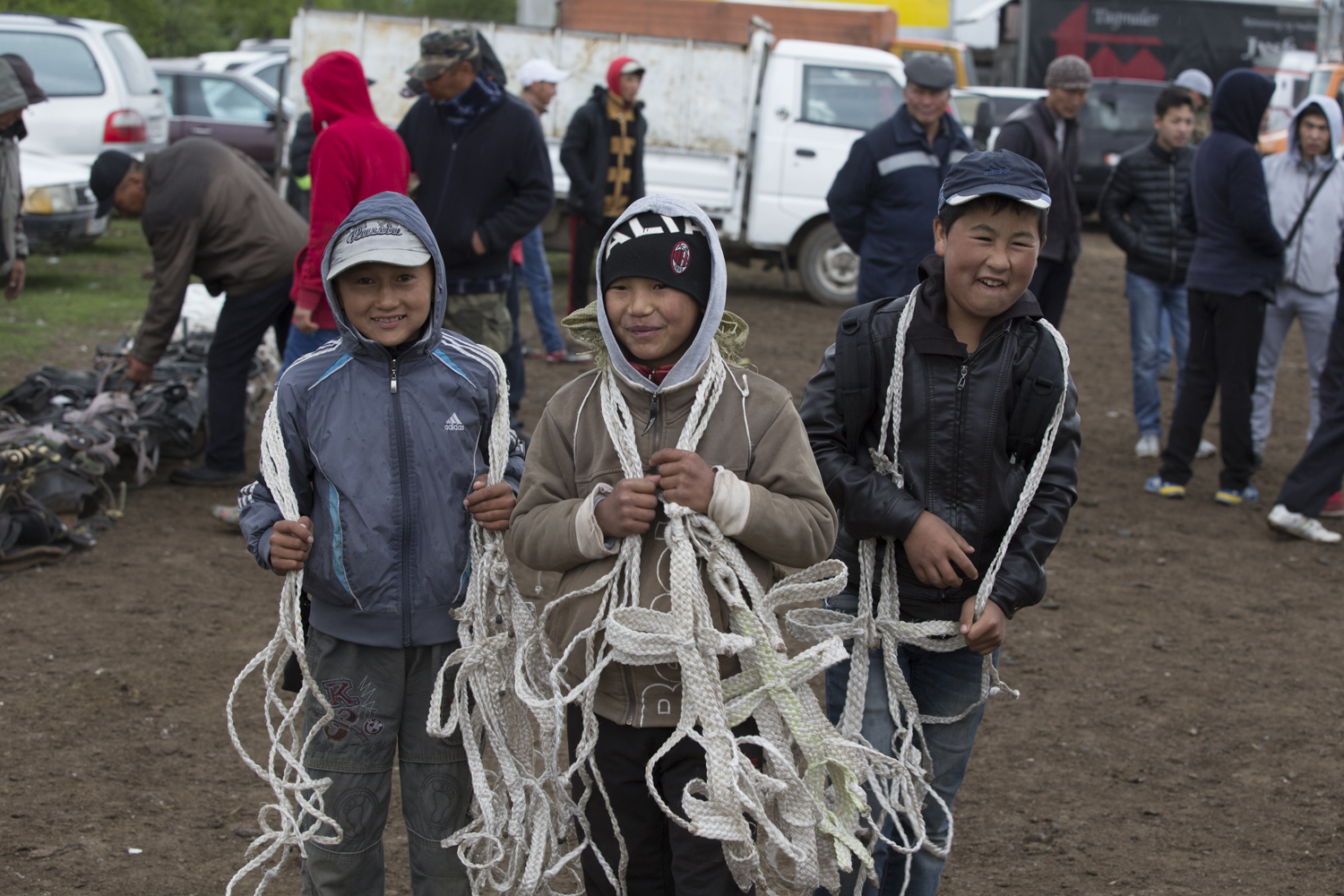 Kids selling harnesses - In Kyrgyzstan it's considered extremely bad luck to sell a horse with its harness.