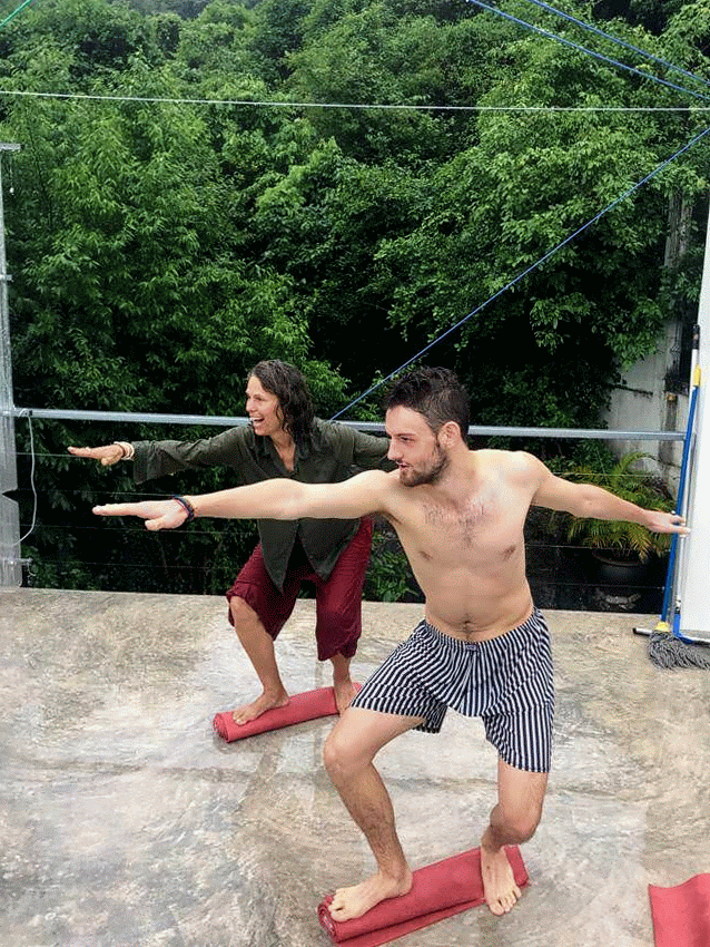 Olive Retreat Yoga in the rain surf.gif