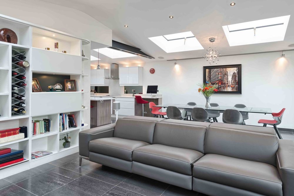 Seating area sofa of a modern house extension by Harvey Norman Architects St Albans