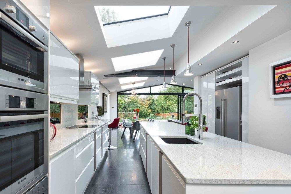 Kitchen view of a modern house extension by Harvey Norman Architects St Albans