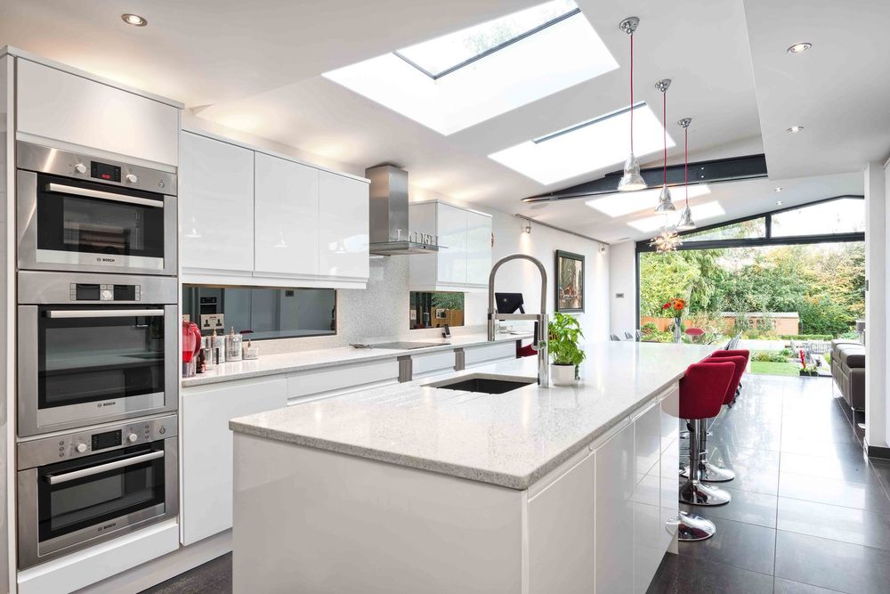 Kitchen view of a modern house extension by Harvey Norman Architects St Albans