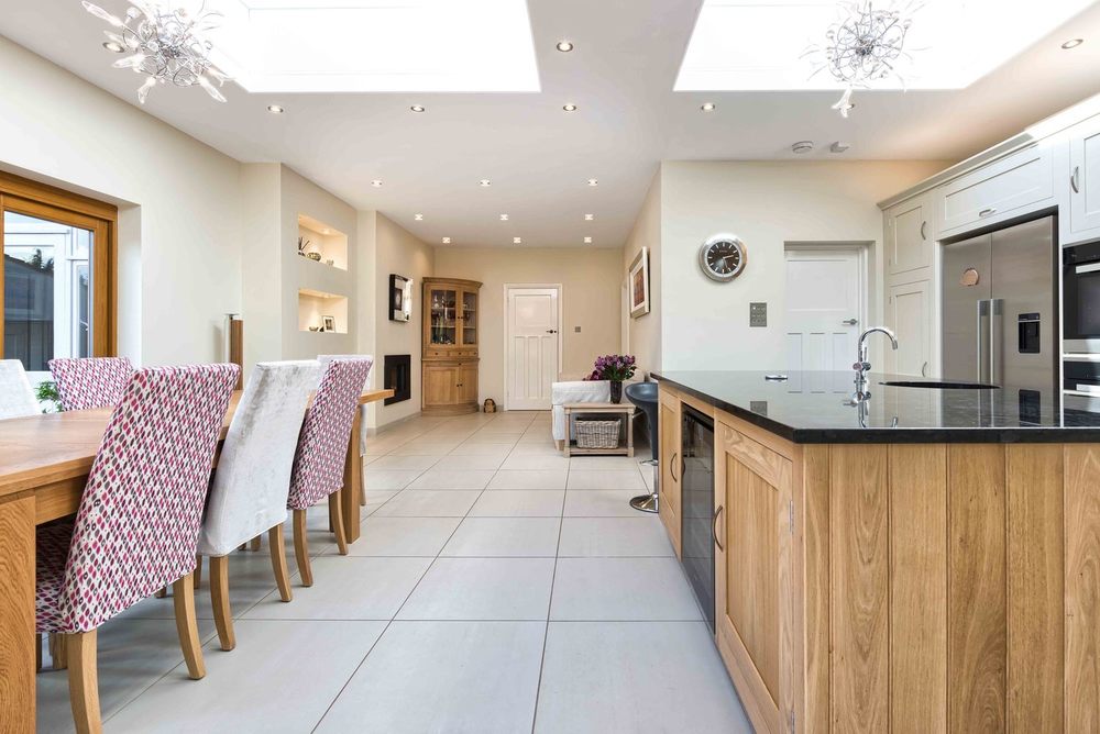 The dining room and kitchen view a house extension by Harvey Norman Architects St Albans