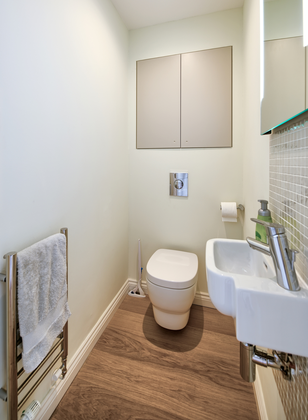 Downstairs toilet of a Scandinavian house extension by Harvey Norman Architects Bishop's Stortford