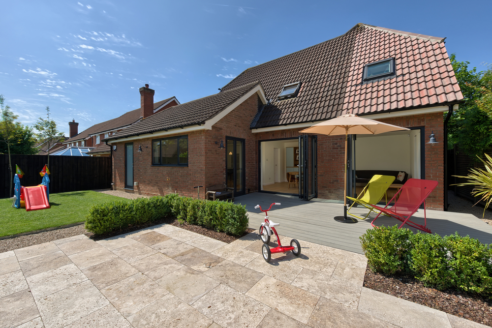 Garden pavement of a Scandinavian house extension by Harvey Norman Architects Bishop's Stortford