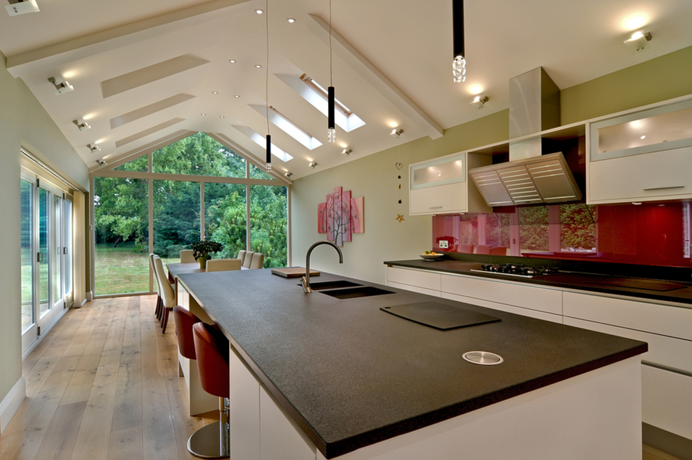 Island counter of a house extension by Harvey Norman Architects Cambridge